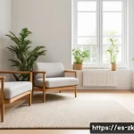 Home 22 단순함의 철학과 심리적 안정 - A serene, minimalist living room bathed in natural soft light, featuring neutral tones like beige an...